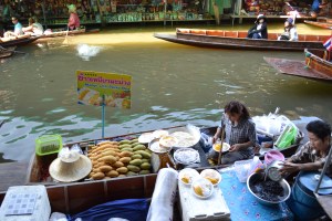 Selling Mango Sticky Rice at the floating market