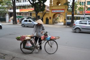 Woman carries goods for sale